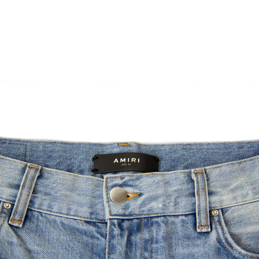 DISTRESSED DENIM SHORT