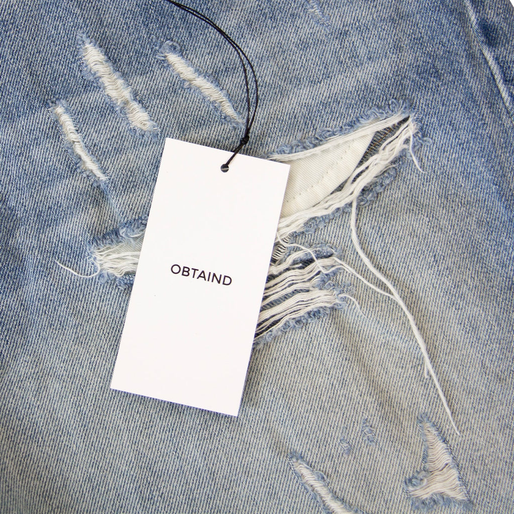 DISTRESSED DENIM SHORT