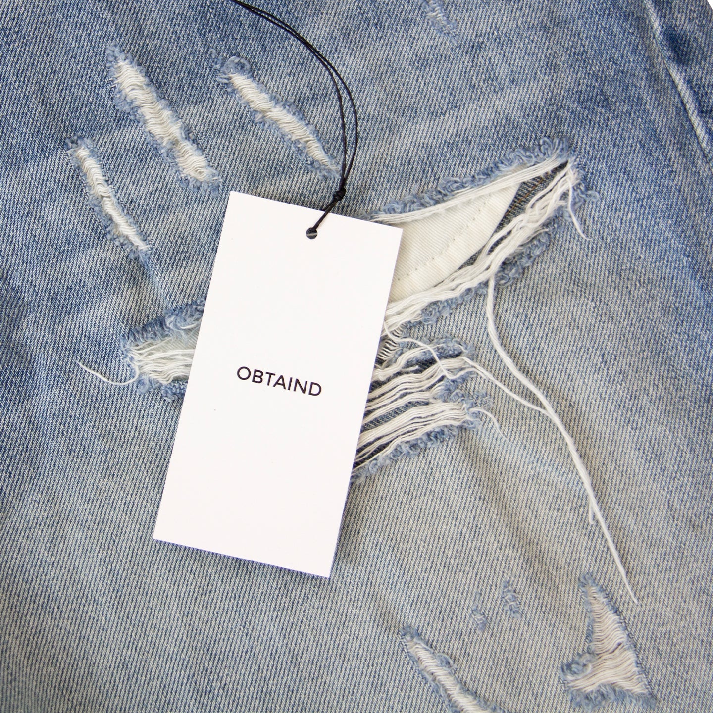 DISTRESSED DENIM SHORT