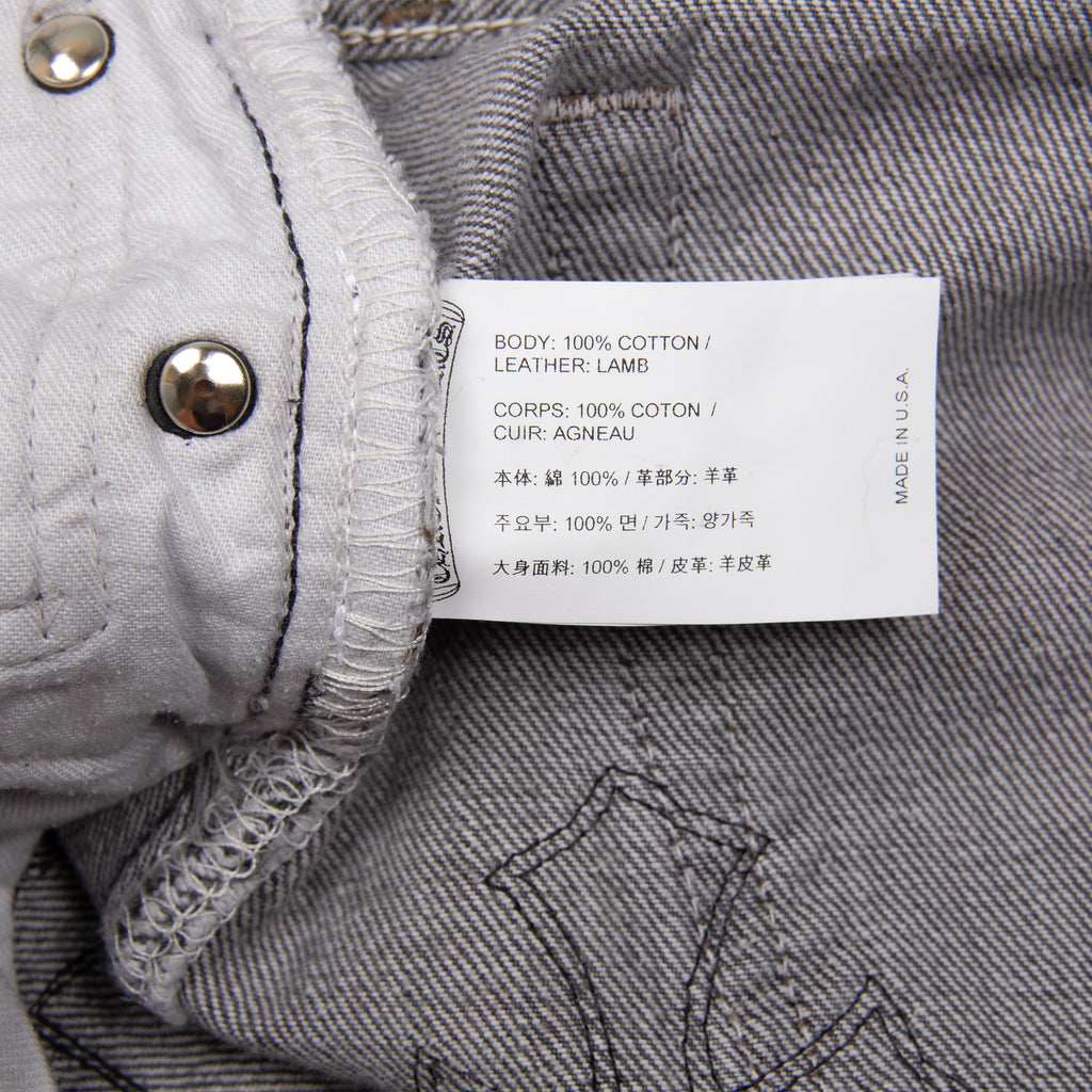 BLACK PATCHES ON PATCHES DENIM