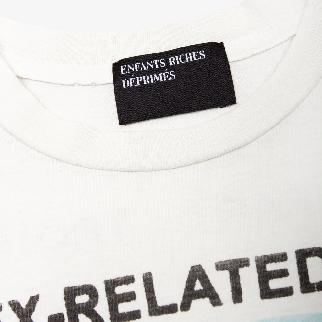 RELATED CRIMES TEE