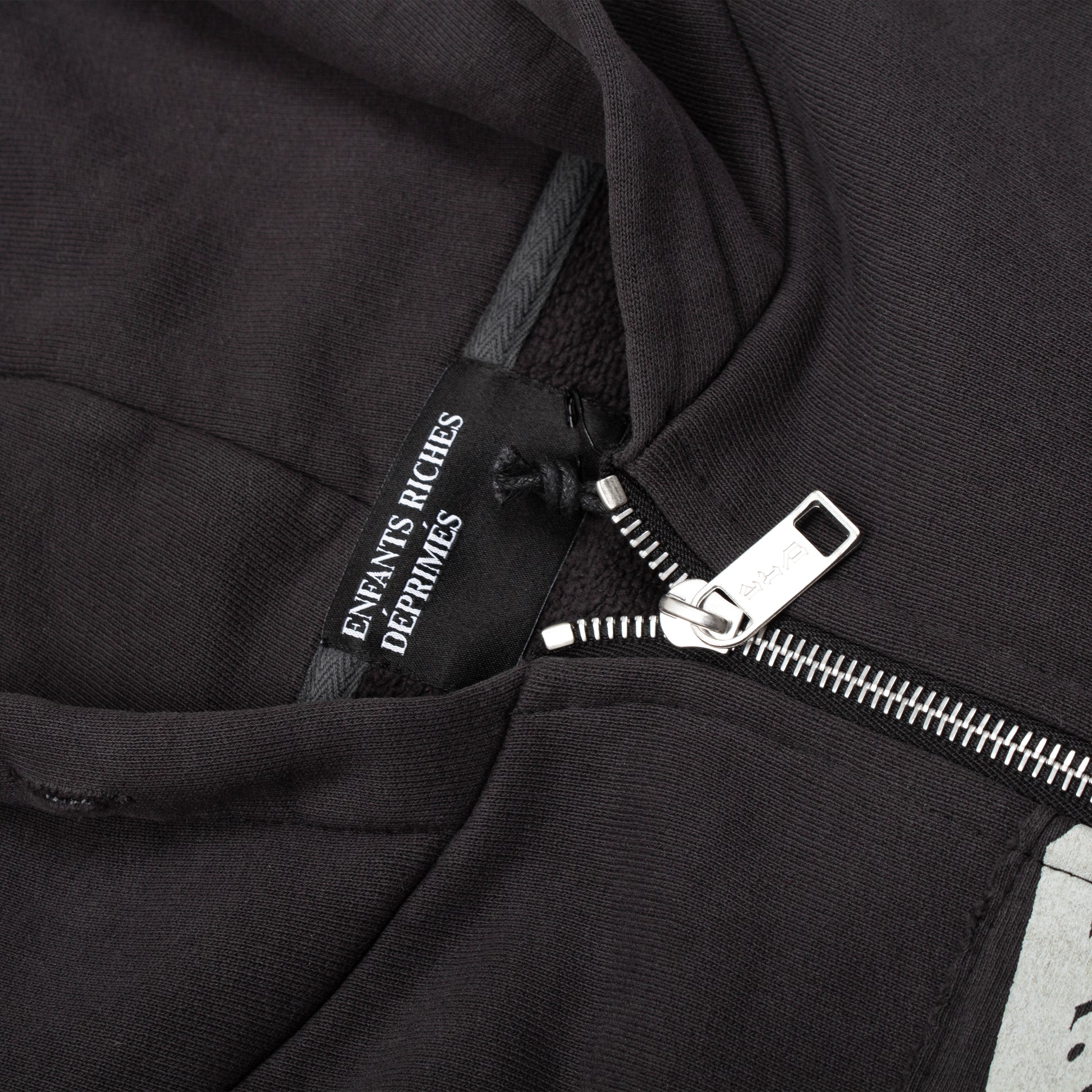 ASSEMBLAGE HOLY BIBLE ZIP HOODIE