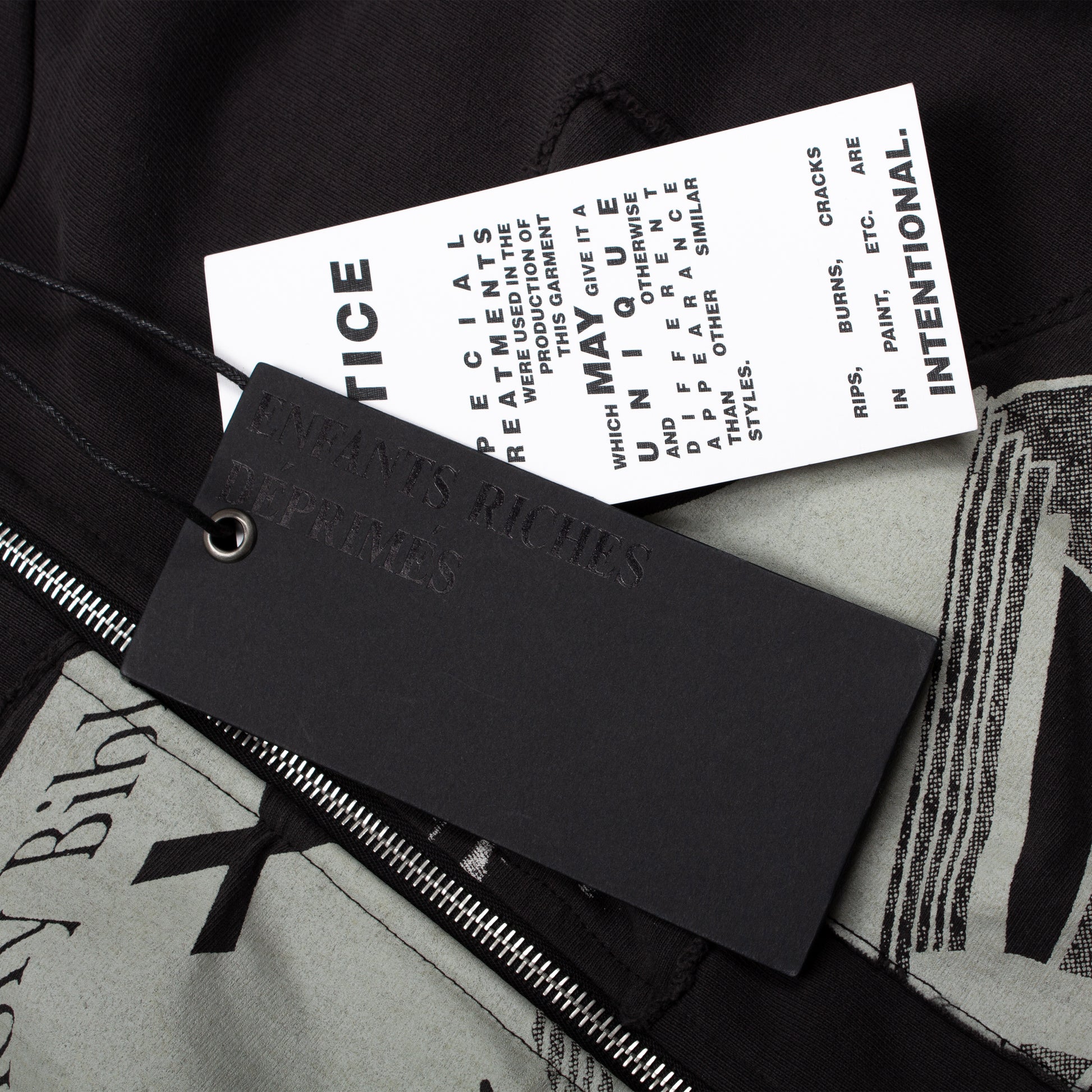 ASSEMBLAGE HOLY BIBLE ZIP HOODIE